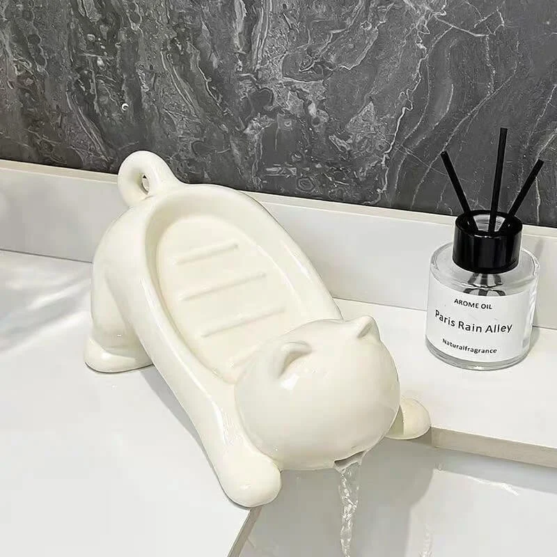 Cat-shaped ceramic soap dish with self-draining grooves