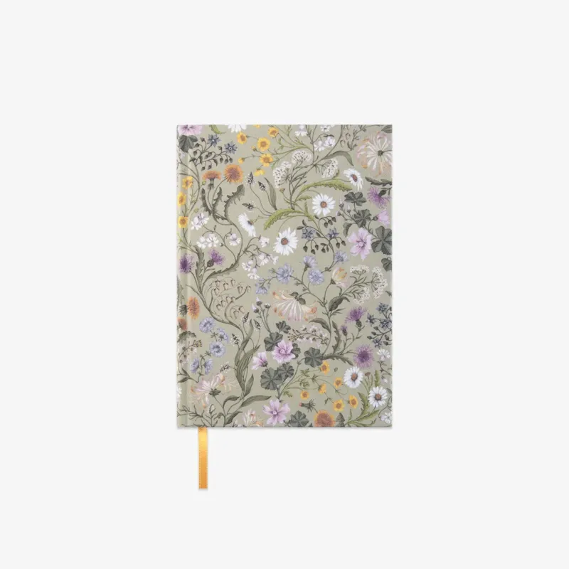 Floral notebook with a yellow ribbon on a white background